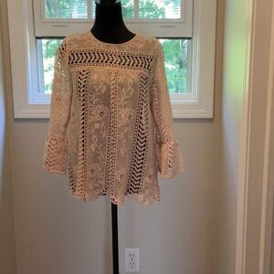 Laced salmon color blouse.